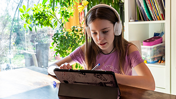 girl-with-tablet-at-home