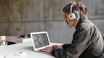 man-looking-at-laptop